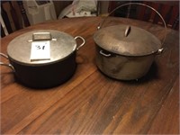 (2) Cookers (Aluminum 1 with Iron Lid)