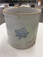 Western stoneware crock has crack