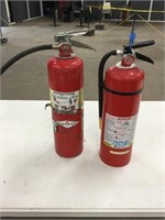 2  fully charged fire extinguishers