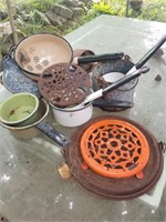 Lot of enamel and cast-iron kitchen accessories
