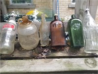 Lot of vintage glass drinking bottles
