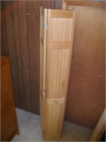 Wooden bi-fold door