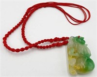 3-Color Jadeite Pendant on a Nylon Necklace.