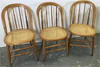 Three Oak cane seat chairs