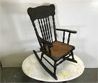 Child's pressed back rocking chair