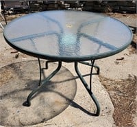 Round glass topped patio table, 42" diameter