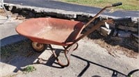 Wheelbarrow, some rust, solid tire