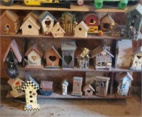 Wooden shelf with birdhouse collection
