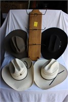 Hat hanger and 4 cowboy hats 7 3/8 size