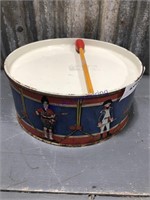 Tin drum w/ drumstick, 8" across