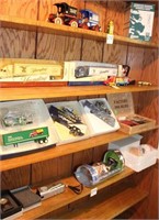 4 shelves of collectible vehicles: