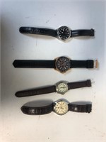 Lot of four men’s wristwatches