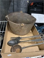 cast iron kettle and utensils