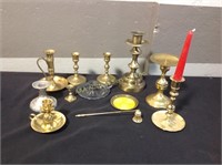 Candlesticks, mostly brass