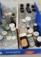 Box of old medicine bottles