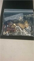 Bag of costume jewelry bracelets necklaces hat