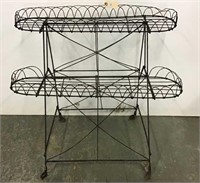 Antique wire plant stand