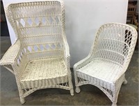 Two painted rattan chairs