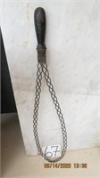 Antique metal braided rug beater