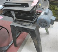 table saw on metal stand