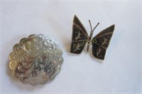 Two sterling silver brooches