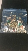 Bag of jewelry pieces and parts including some
