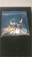 Bag of pins and brooches