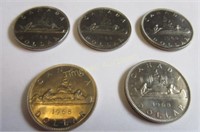 Five 1968 Canadian dollar coins