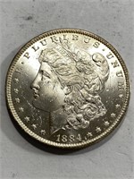 1884 o CRISP BU DMPL Morgan Dollar