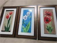 Trio of framed floral tiles