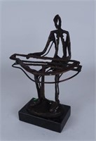 ABSTRACT METAL SCULPTURE OF PIANO PLAYER
