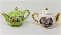 (2) Teapots w/ Thomas Kinkade