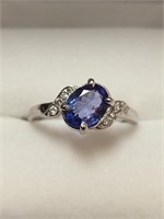 $800 10K  Tanzanite(0.95ct) Diamond(I1, 0.06ct) Ri