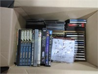 Box of CDs and DVDs