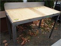Stainless steel table w/ plywood top