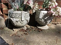 2 concrete flower pots and flowers