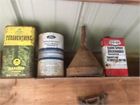 Lot of tins and funnel