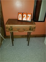 table made from a vintage suitcase