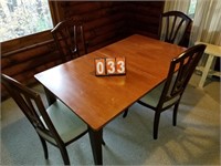 wood dinning room table and 4 chairs