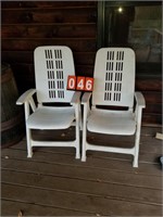 pair of white folding chairs