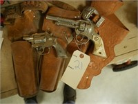 2 cap pistols & holsters