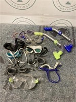 Bucket of pool goggles and snorkels and toys