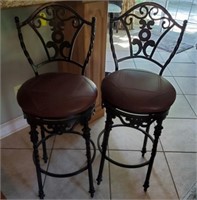 PAIR OF IRON BAR STOOLS