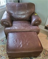 BROYHILL LEATHER ARM CHAIR AND OTTOMAN