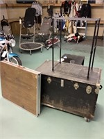 Rolling travel trunk, folding table, metal rack
