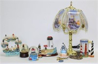 Lighthouse items to include table lamp, wreath,