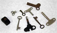 (8) asstd keys & brass pencil sharpener in pouch,