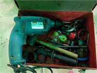 Makita electric drill with assorted Bits