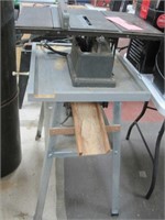 Sears table saw on metal shop stand