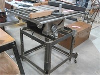 Craftsman table saw on metal shop stand